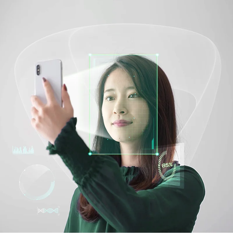 A person taking a selfie

Description automatically generated